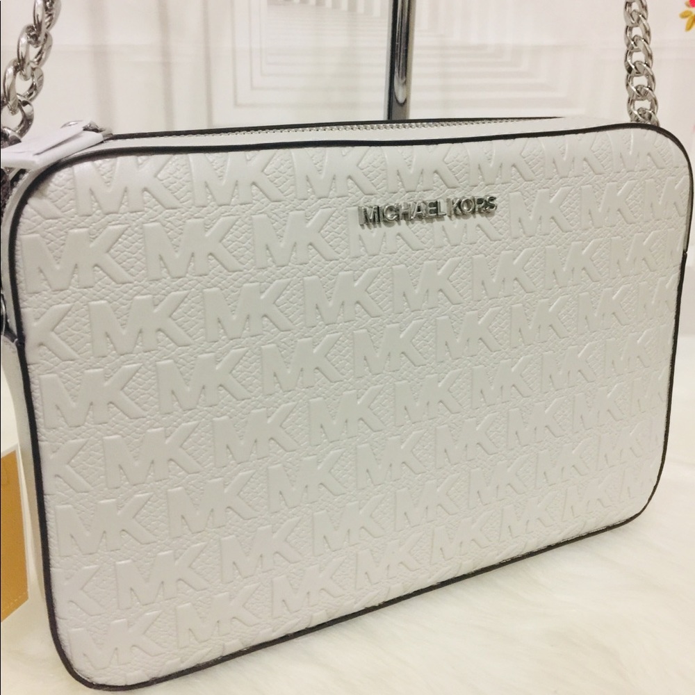 Michael Kors debossed leather Crossbody bag - Picture 3 of 11
